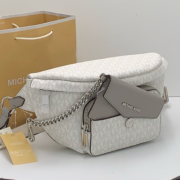 MICHAEL KORS
Maisie Large Logo 2-in-1 Sling Pack
Optic White/Silver 
NWT - Picture 1 of 16